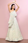 Buy_Naintara Bajaj_Off White Silk Printed Floral Stripe Asymmetric Lehenga And Blouse Set_at_Aza_Fashions