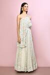 Naintara Bajaj_Off White Silk Printed Floral Stripe Asymmetric Lehenga And Blouse Set_at_Aza_Fashions