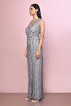 Naintara Bajaj_Grey Chinnon Embroidery Sequin V Neck Stripe Jumpsuit_at_Aza_Fashions