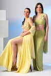 Buy_Richa Jaisinghani Label_Yellow Lycra Hand Embroidered Cut Dana Halter Neck Blouse Skirt Set  _Online_at_Aza_Fashions