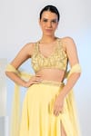 Shop_Richa Jaisinghani Label_Yellow Lycra Hand Embroidered Cut Dana Halter Neck Blouse Skirt Set  _Online_at_Aza_Fashions