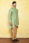 Shop_Arihant Rai Sinha_Green Kurta Jacquard Asymmetric Floral Pattern And Churidar Set _Online_at_Aza_Fashions