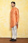 Buy_Arihant Rai Sinha_Orange Jacquard Asymmetric Kurta_Online_at_Aza_Fashions