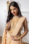 Shop_MeenaGurnam_Peach Net Hand Embroidered Cut Dana Plunged V Sequin Dhoti Saree With Blouse _at_Aza_Fashions