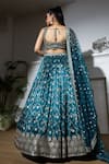 MeenaGurnam_Blue Net Embroidered Dabka Sweetheart Floral Jaal Bridal Lehenga Set _Online_at_Aza_Fashions