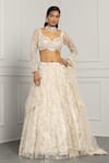 Buy_MeenaGurnam_Ivory Net Embroidery Beads Asymmetric Neck Floral Sequin Bridal Lehenga Set _at_Aza_Fashions