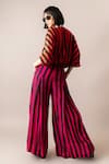 Shop_Nupur Kanoi_Multi Color Crepe Printed Stripe V Collar Block Jumpsuit  _at_Aza_Fashions