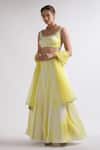 Buy_Roohbyridhimaa_Yellow Viscose, Crepe Embroidery Round Neck Mukhee Abstract Pattern Lehenga Set _at_Aza_Fashions