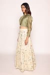 Buy_ABSTRACT BY MEGHA JAIN MADAAN_Green Silk With Zari Blend Leg Of Mutton Sleeves Crop Top Boho Fleur Skirt _Online_at_Aza_Fashions