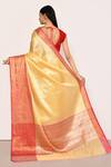 Shop_Nazaakat by Samara Singh_Yellow Saree Banarasi Tissue Silk Woven Mughal And With Running Blouse Piece_at_Aza_Fashions