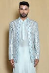 Aryavir Malhotra_Blue Silk Woven Lobelia Bloom Maze Jacket Kurta Set _at_Aza_Fashions