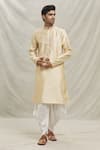 Buy_Arihant Rai Sinha_Gold Kurta Silk Blend Embroidered Sequin Floral Embellished With Dhoti Pant _at_Aza_Fashions