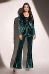 Buy_B'Infinite_Emerald Green Velvet Woven Sequin Shawl Collar Blazer Trouser Set _at_Aza_Fashions