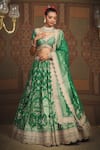 Buy_SHIKHAR SHARMA_Green Banarasi Floral Woven Leaf Neck Bridal Lehenga Set _at_Aza_Fashions