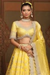 Buy_SHIKHAR SHARMA_Yellow Banarasi Floral Woven Leaf Neck Checkered Bridal Lehenga Set _Online_at_Aza_Fashions