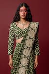 Shop_Ridhimaa Gupta_Green Viscose Raw Silk Deveshi Bandhani Pattern Pre-draped Saree With Blouse _at_Aza_Fashions