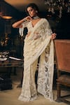 Buy_Seema Gujral_Ivory Net Embroidered Sequins Plunged V Floral Saree With Blouse  _at_Aza_Fashions