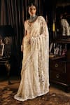 Seema Gujral_Ivory Net Embroidered Pearls Plunged V 3d Floral Saree With Blouse  _Online_at_Aza_Fashions