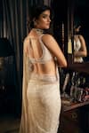 Shop_Seema Gujral_Ivory Net Embroidered Geometric Leaf Sequin Saree With Blouse  _at_Aza_Fashions