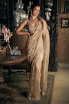 Buy_Seema Gujral_Beige Net Embroidered Sequin Leaf Saree With Blouse  _at_Aza_Fashions