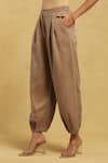 Ritu Kumar_Brown Cotton Viscose Plain Pleated Tapered Pant _Online_at_Aza_Fashions