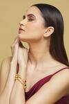 Shop_Nepra By Neha Goel_Gold Plated Stones Embellished Bangles - Set Of 4_Online_at_Aza_Fashions