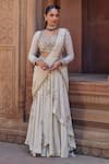 Buy_Studio Bagechaa_Ivory Raw Silk Embroidered Pot Sweetheart Neck Janvi Skirt Saree With Blouse _at_Aza_Fashions