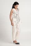 Shop Madder Much White Handloom Cotton, Chanderi Silk, Irwin Floral Sleeveless Top And Pant Set at Aza Fashions Shop_Madder Much_White Handloom Cotton, Chanderi Silk, Irwin Floral Sleeveless Top And Pant Set _at_Aza_Fashions