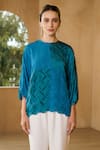 Shop_Pleats by Aruni_Blue Crepe Textured Round Neck Sydney Blouse _Online_at_Aza_Fashions