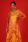 Shop_SAKSHAM & NEHARICKA_Orange Velvet Hand Painted Floral Round Ebru Kurta And Pant Set  _at_Aza_Fashions