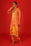 Buy_SAKSHAM & NEHARICKA_Orange Velvet Hand Painted Floral Round Ebru Kurta And Pant Set  