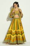 Vandana Sethi_Yellow Silk Crystals, Tassels, Mirrors Chevron Pattern Lehenga Set With Shrug _at_Aza_Fashions