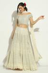 Buy Vandana Sethi Ivory Net Crystals, Embroidery Off-shoulder Chikankari Work Lehenga Set at Aza Fashions Buy_Vandana Sethi_Ivory Net Crystals, Embroidery Off-shoulder Chikankari Work Lehenga Set _at_Aza_Fashions