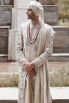 MATSYA_Cream Raw Silk Hand Embroidered Resham Udaibagh Shikargah Sherwani Set  _Online_at_Aza_Fashions