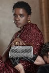 Buy_Tann-ed_Silver Textured Woven Clutch _at_Aza_Fashions