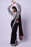 Kavitha Gutta_Black Saree Georgette Hand Embroidered Striped V Neck Pattern With Blouse_Online_at_Aza_Fashions