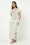 Buy_Kaveri_Off White Linen Embroidery Round Neck Leaf Embellished Top _at_Aza_Fashions