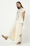 Shop_Kaveri_Off White Linen Embroidery Round Neck Leaf Embellished Top _Online_at_Aza_Fashions