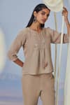 Kaveri_Beige Linen Embroidery Round Neck Rosette Bud Top _Online_at_Aza_Fashions