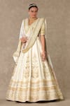 Masaba_Ivory Lehenga And Blouse Raw Silk Embellished Dori V Neck Neel Kamal Bridal Set_Online_at_Aza_Fashions