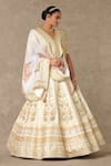 Shop_Masaba_Ivory Lehenga And Blouse Raw Silk Embellished Dori V Neck Neel Kamal Bridal Set_Online_at_Aza_Fashions