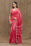 Samyukta Singhania_Red Silk Print Bandhani V Neck Pattern Saree With Blouse _Online_at_Aza_Fashions