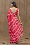 Shop_Samyukta Singhania_Red Silk Print Bandhani V Neck Pattern Saree With Blouse _at_Aza_Fashions