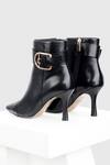 Shop_OROH_Black Plain Leandra Side Buckle Ankle Boots _at_Aza_Fashions