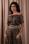 Vara by Vibha n Priti_Black Silk Print Tribal Age Off Shoulder Jumpsuit With Embroidered Belt _Online_at_Aza_Fashions