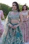 Astha Narang_Green Organza Printed Floral Round Blouse Lehenga Set For Women_at_Aza_Fashions