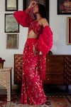 Moledro_Red Blouse Butterfly Net Embellished Sequin Halter Saavi Draped Skirt Set _at_Aza_Fashions