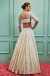 Shop_SAMMOHI BY MOKSHA AND HIRAL_Ivory Lehenga Dupion Silk Hand Embroidery Beads Tear Drop Self Bridal Set _at_Aza_Fashions