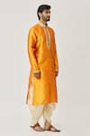 Buy_Arihant Rai Sinha_Orange Kurta Art Silk Embroidered Thread Cuff And Dhoti Pant Set _Online_at_Aza_Fashions