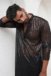 Mahima Mahajan_Black Net Embroidery Sequin Emir Brazen Sheer Kurta With Pant_at_Aza_Fashions